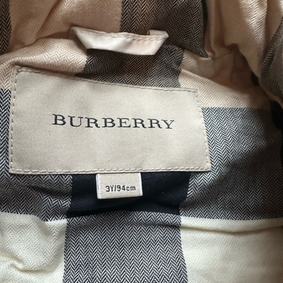 Toddler size Burberry tan puffer with traditional plaid inside.  Worn twice - Picture 3 of 3